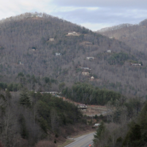 A view from the highway looks out over rural homes that speckle the foothills of Appalachia in the winter