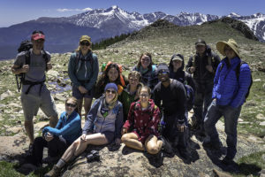 group of studnets with mountains in background