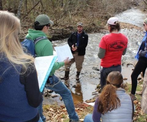 Jason Meador of the Land Trust for the Little Tennessee talks to ICON students in Cat Creek.