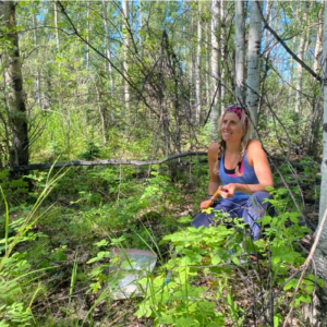 Xanthe Walker organizes tree cores while sampling in the 1987 burn near Delta Junction, Alaska.