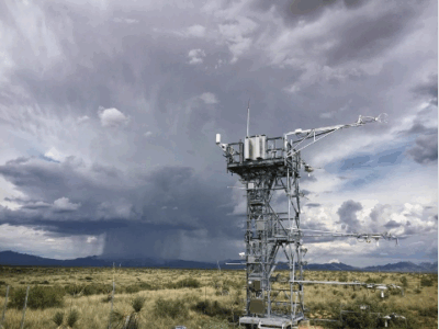 flux tower under a threatening sky at a dryland site