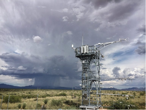 flux tower under a threatening sky at a dryland site