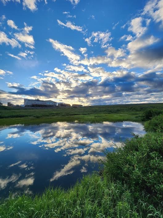 dramatic clouds reflected in a lake