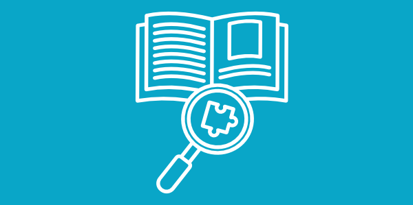 book, magnifying glass, and puzzle piece